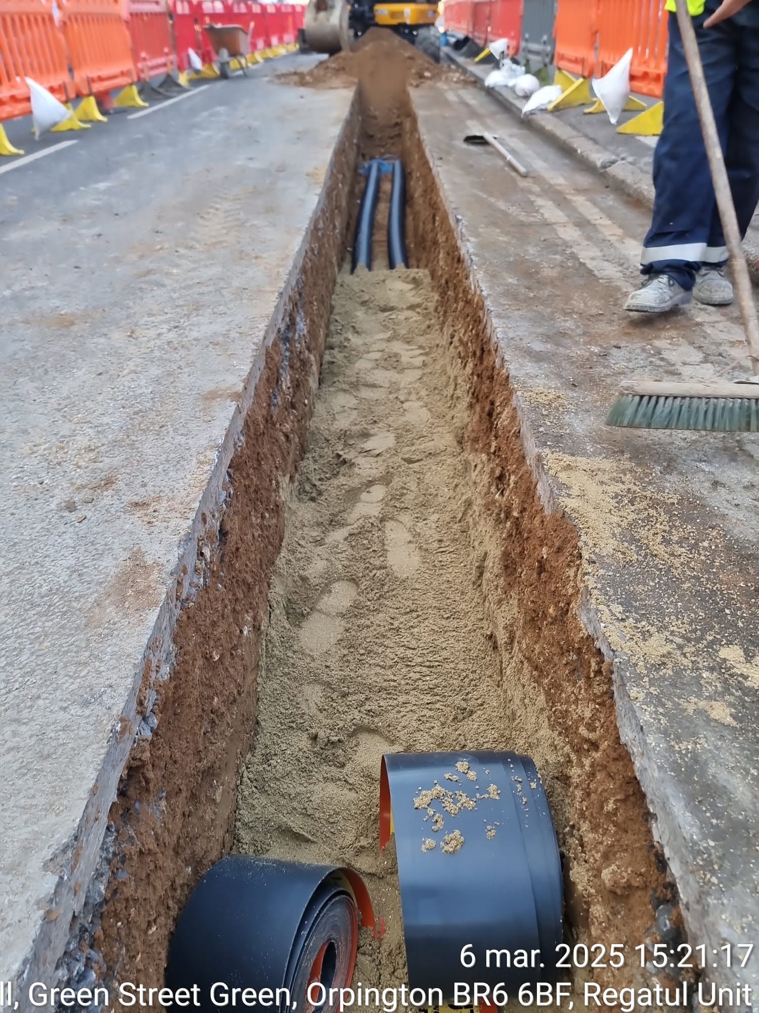 Pipework positioned in a prepared trench with sand bedding